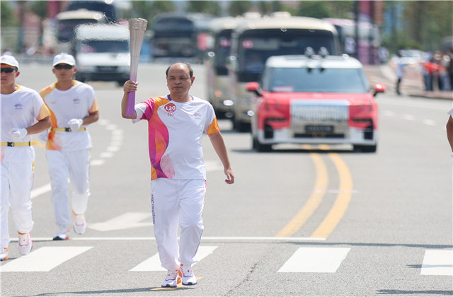 亚运火炬手韦晓青：参与“大莲花”建设，传递火炬一生难忘